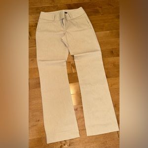 The Limited Exact Stretch dress pant. Size 10R. Length 32. Light tan.